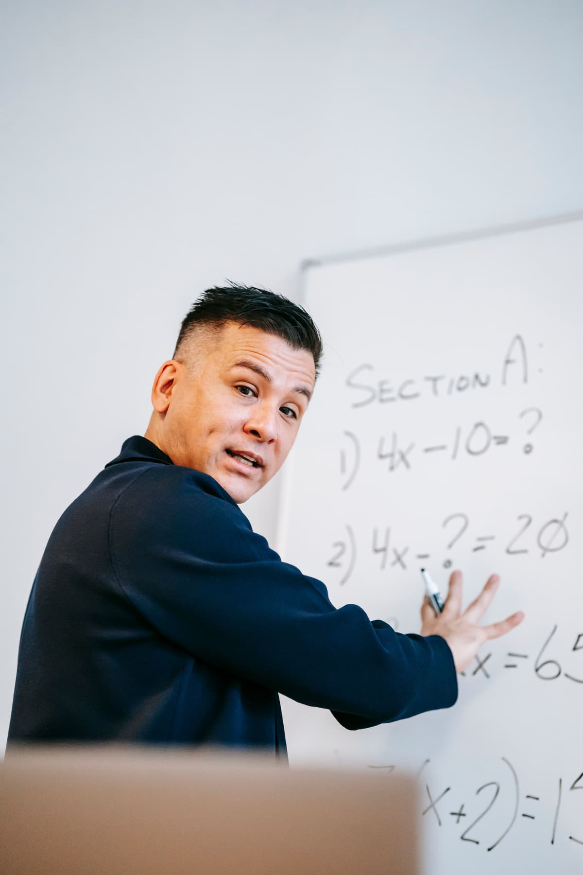Asad teaching a GCSE Maths lesson